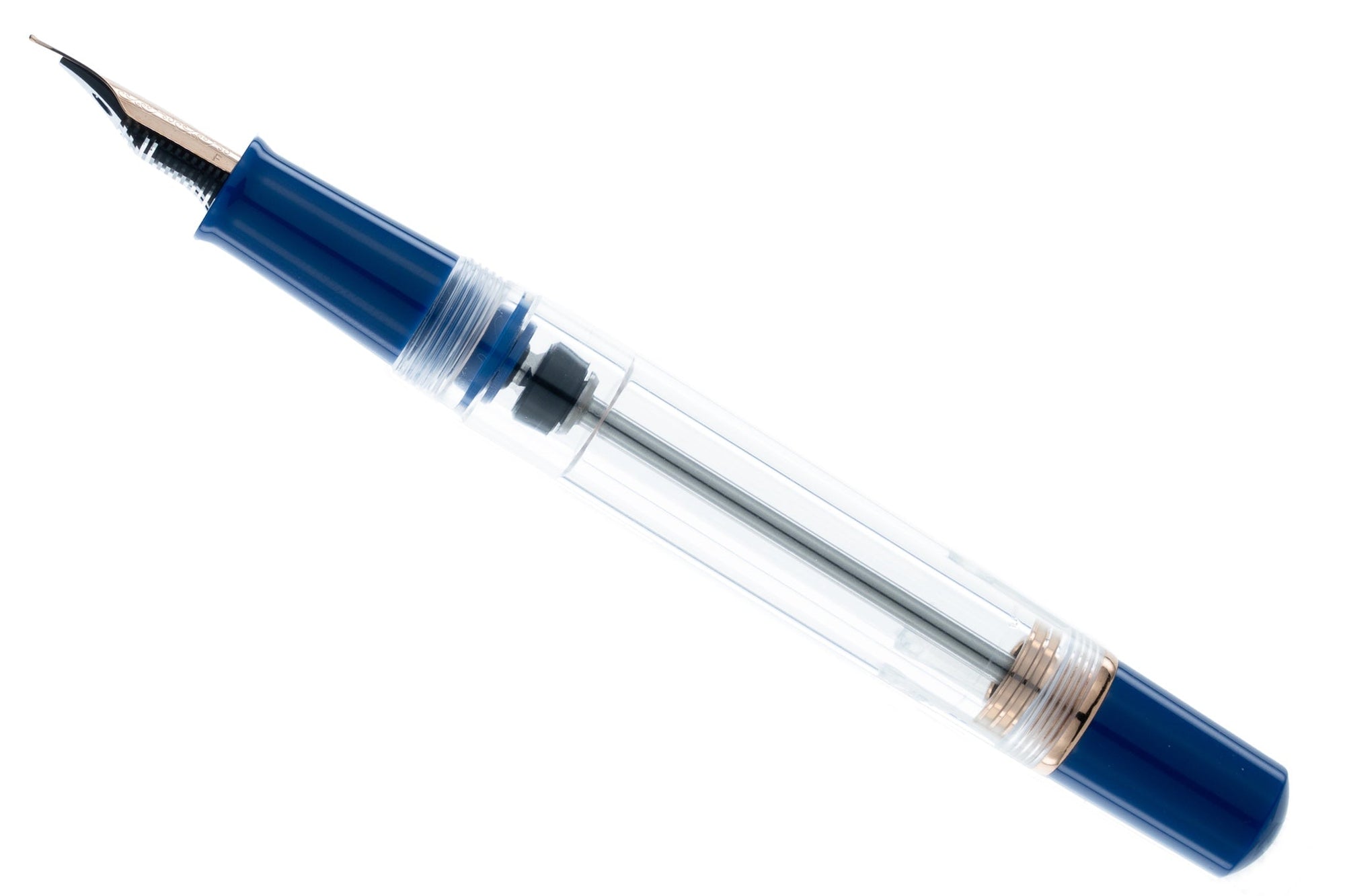 Fountain pen with blue ink cartridge on a white background